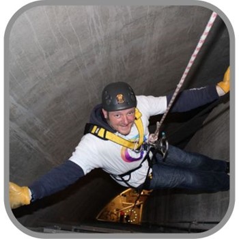 Damian abseiling for National Autistic Society