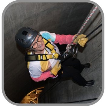 Lyn abseiling for National Autistic Society